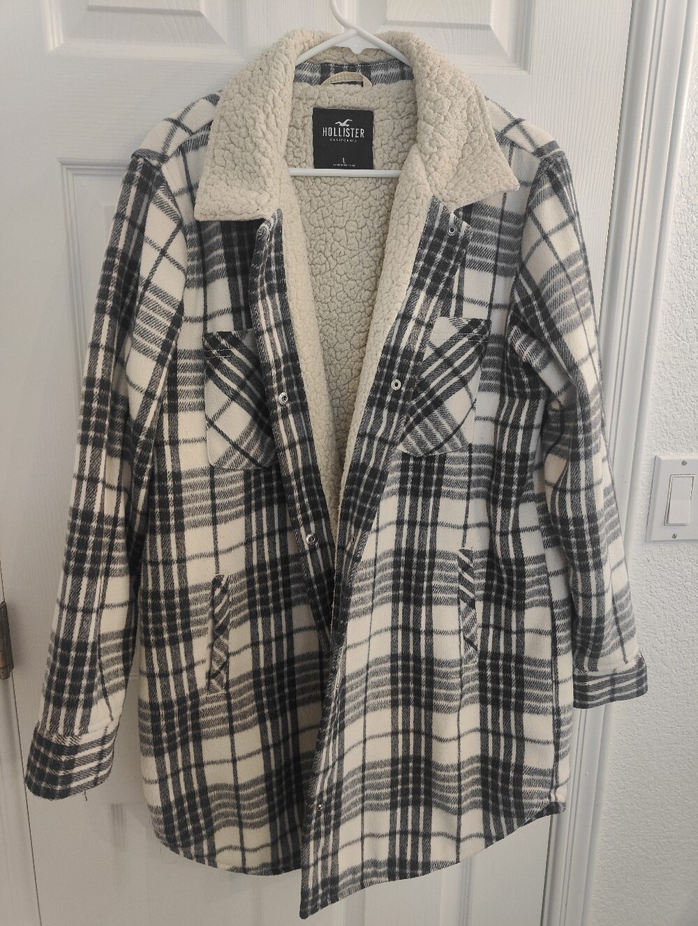 Hollister sherpa-lined flannel shacket featuring a black and white, Large